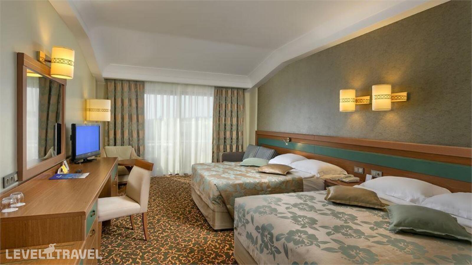 фотографии номера Четырехместный с видом на море отеля Ozkaymak Family Select Resort Hotel в Турция(Авсаллар) - фото №1