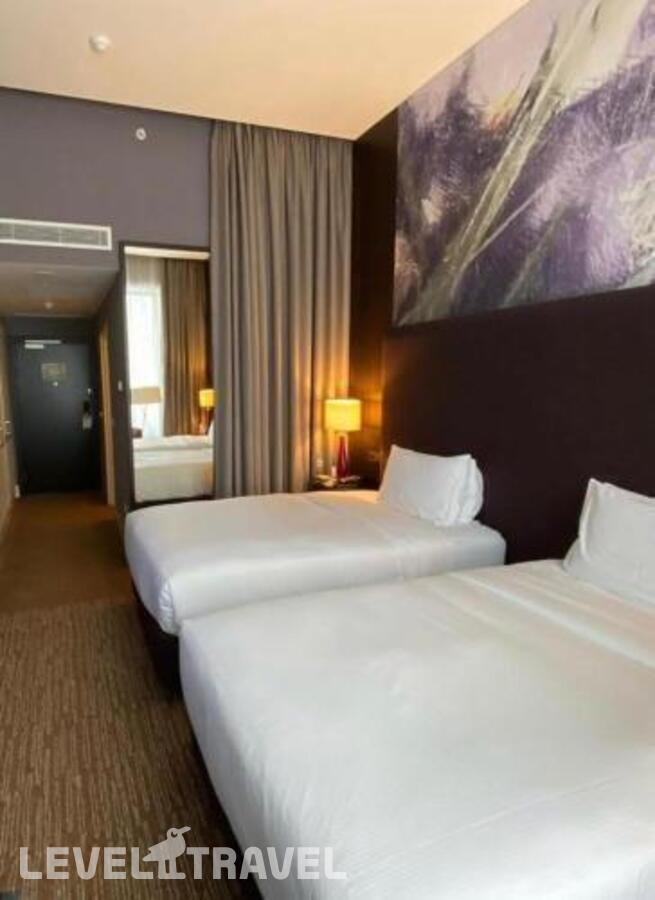 фотографии номера Премиум (две односпальные кровати) отеля Doubletree By Hilton Hotel Moscow Marina в Россия(Северный административный округ (САО)) - фото №2