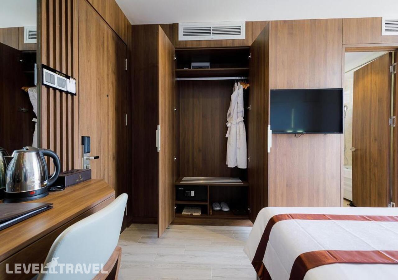 фотографии номера Делюкс (две односпальные кровати) отеля Masova Hotel в Вьетнам(Нячанг) - фото №4