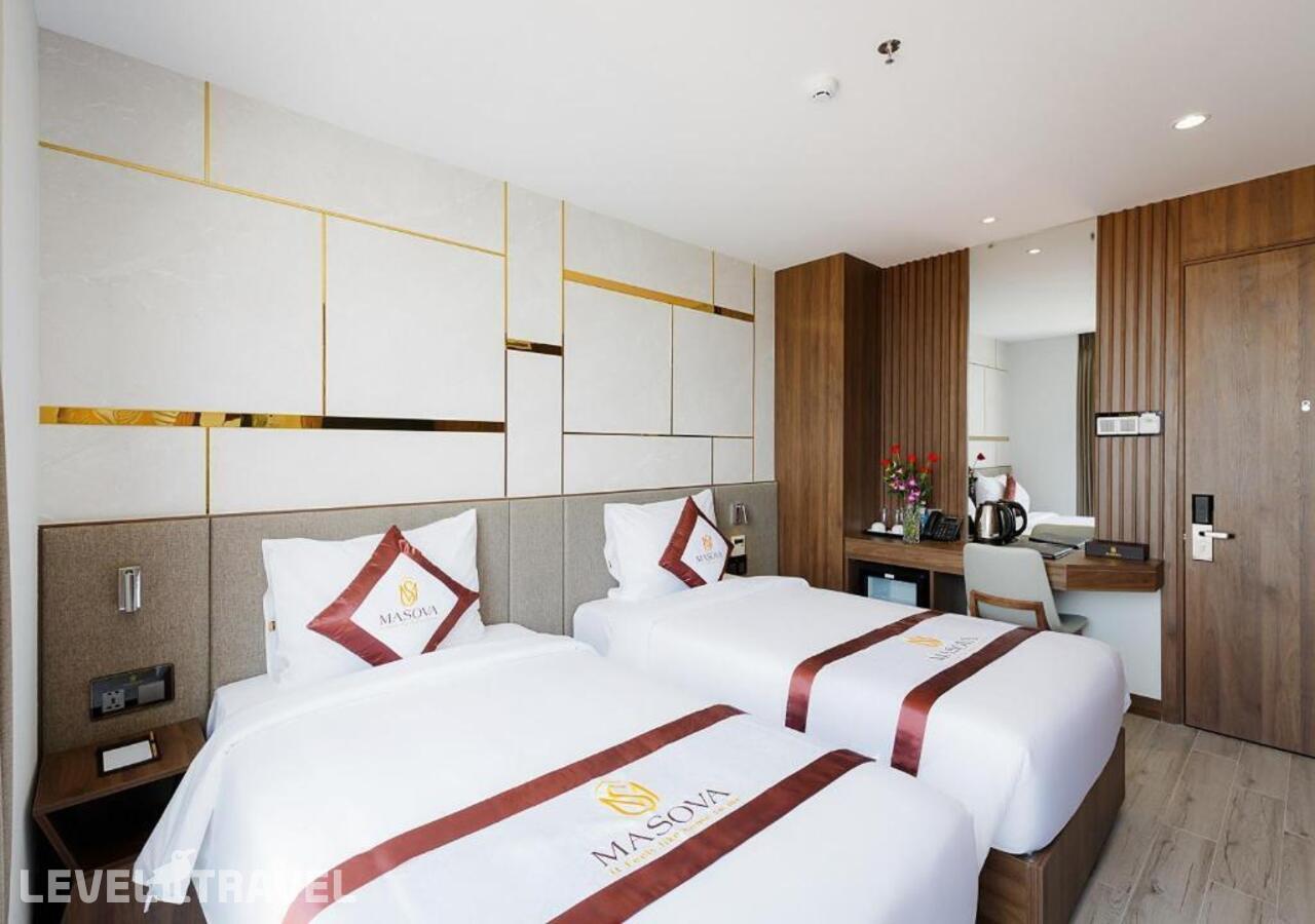 фотографии номера Делюкс (две односпальные кровати) отеля Masova Hotel в Вьетнам(Нячанг) - фото №1