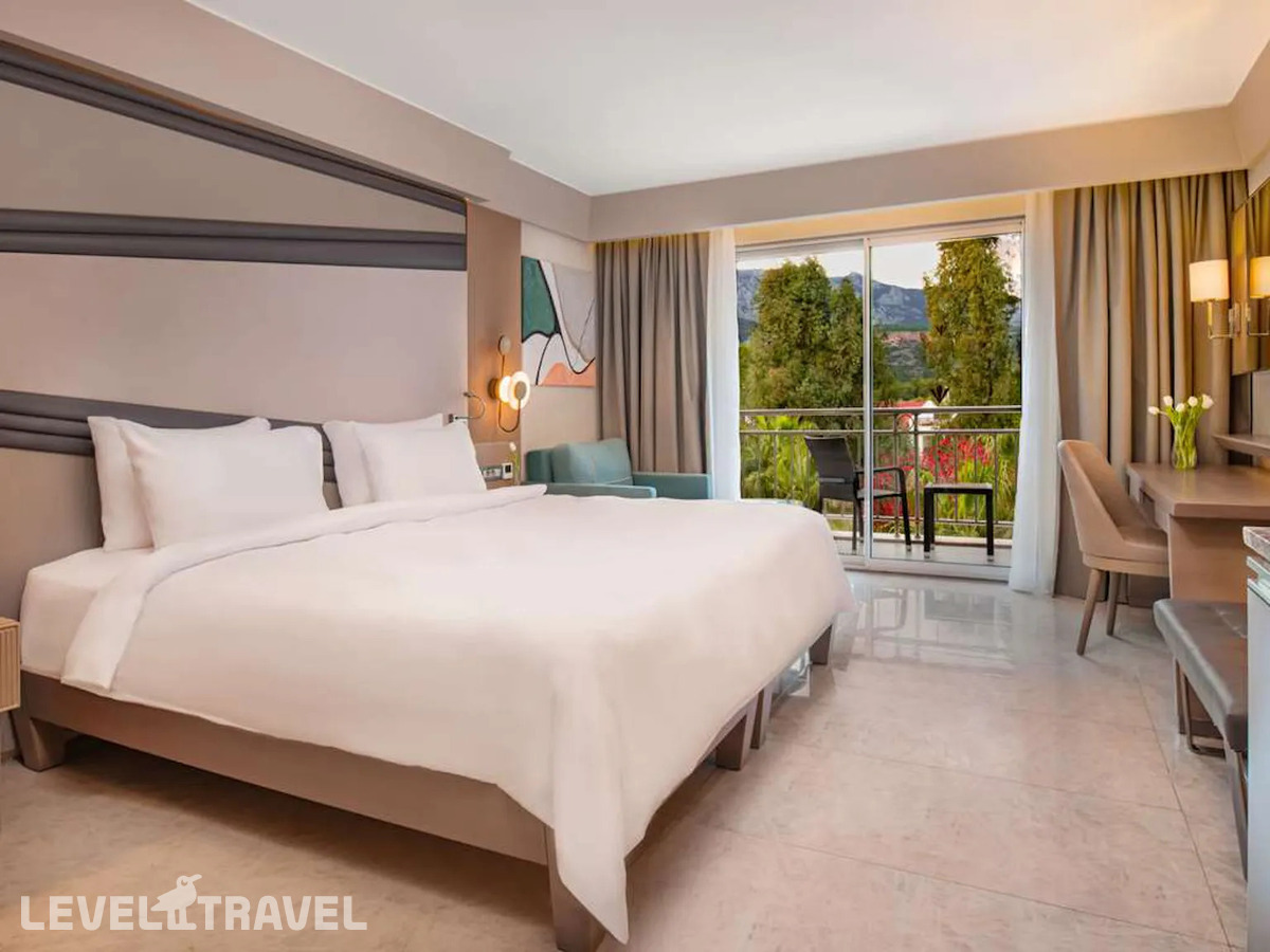 фотографии номера Делюкс с видом на окрестности отеля Rixos Premium Tekirova в Турция(Текирова) - фото №1