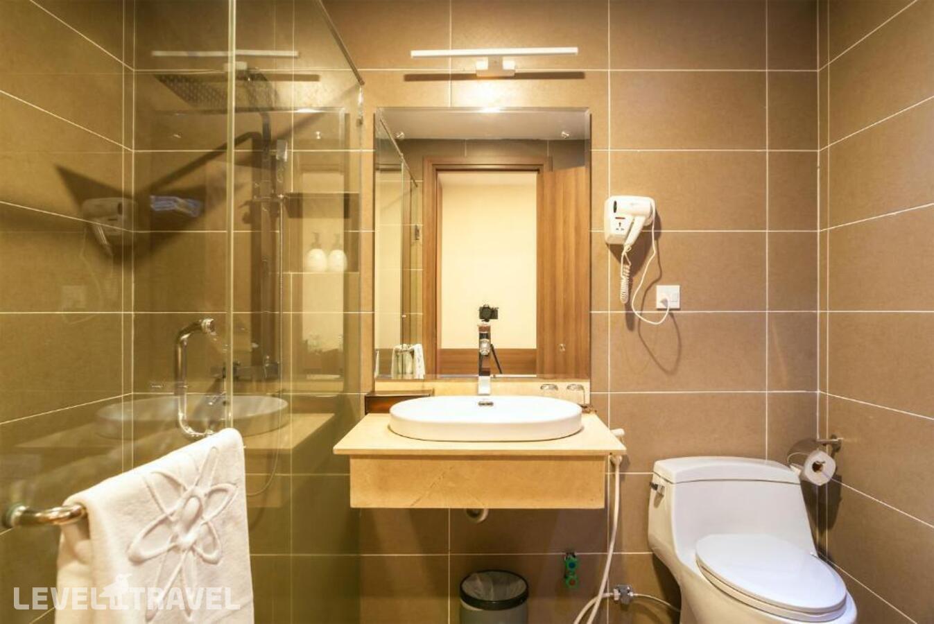 фотографии номера Трехместный семейный отеля Orbit Hotel Resort & Spa в Вьетнам(Нячанг) - фото №2