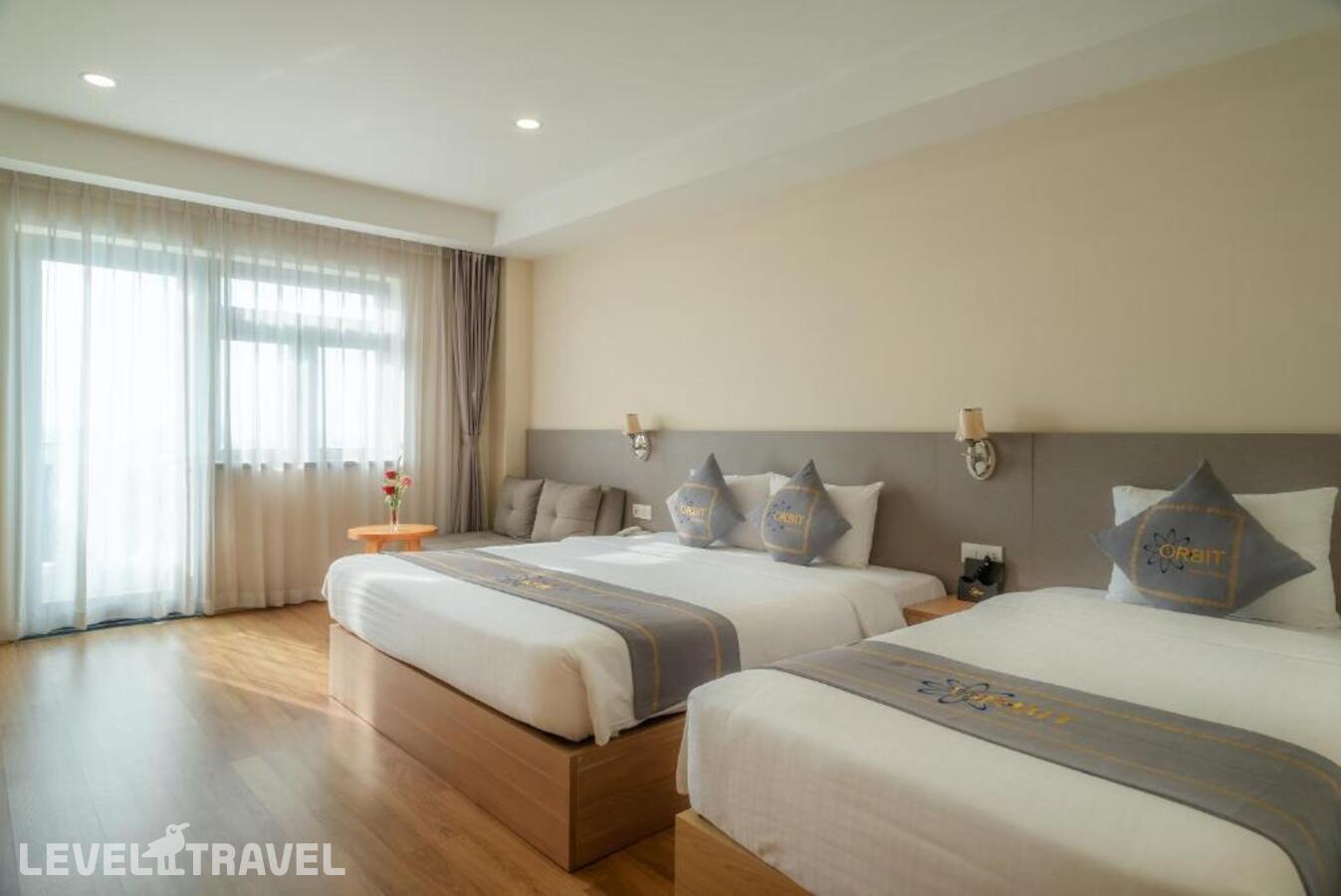 фотографии номера Трехместный семейный с видом на море отеля Orbit Hotel Resort & Spa в Вьетнам(Нячанг) - фото №1