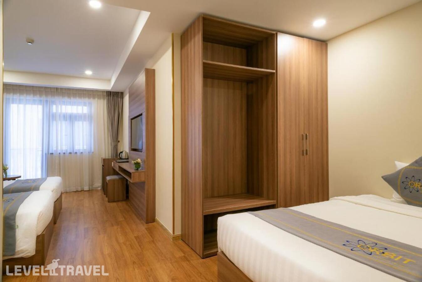 фотографии номера Четырехместный семейный отеля Orbit Hotel Resort & Spa в Вьетнам(Нячанг) - фото №3