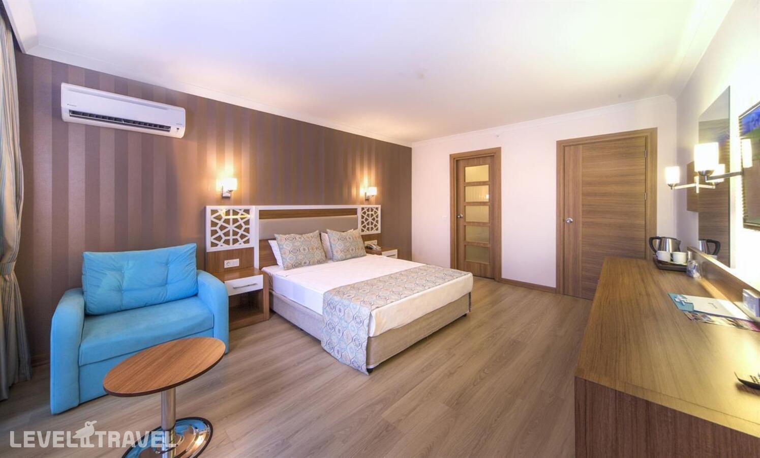фотографии номера Семейный номер отеля Lonicera Resort & Spa в Турция(Тюрклер) - фото №1