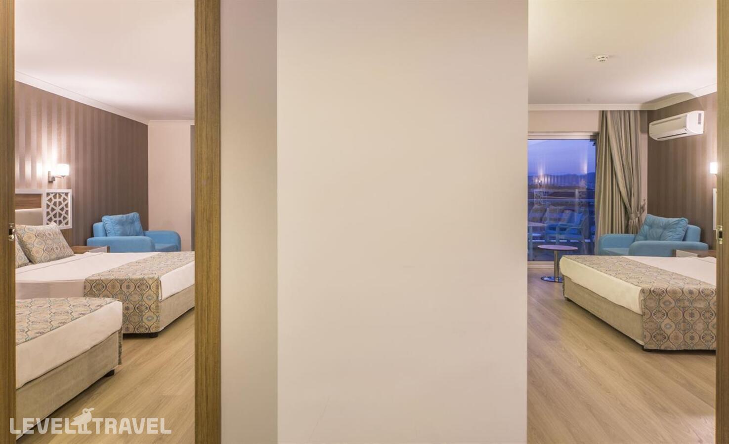 фотографии номера Семейный номер отеля Lonicera Resort & Spa в Турция(Тюрклер) - фото №4