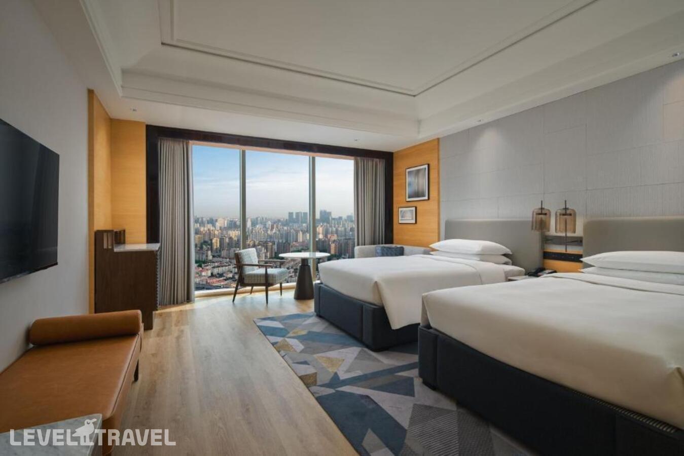 фотографии номера Четырехместный с видом на реку отеля Sheraton Shanghai Pudong Riverside в Китай(Шанхай) - фото №1