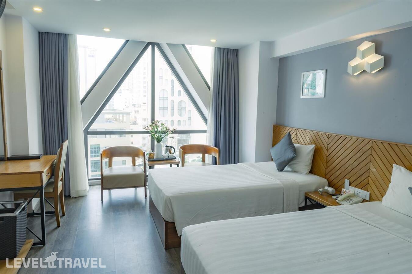 фотографии номера Делюкс с видом на город (две односпальные кровати) отеля Venue Hotel Nha Trang в Вьетнам(Нячанг) - фото №1