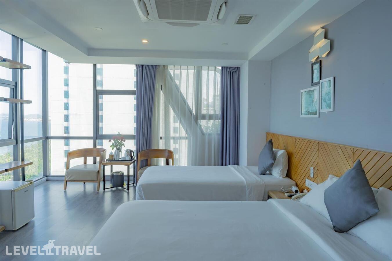 фотографии номера Делюкс Senior (две односпальные кровати) отеля Venue Hotel Nha Trang в Вьетнам(Нячанг) - фото №1