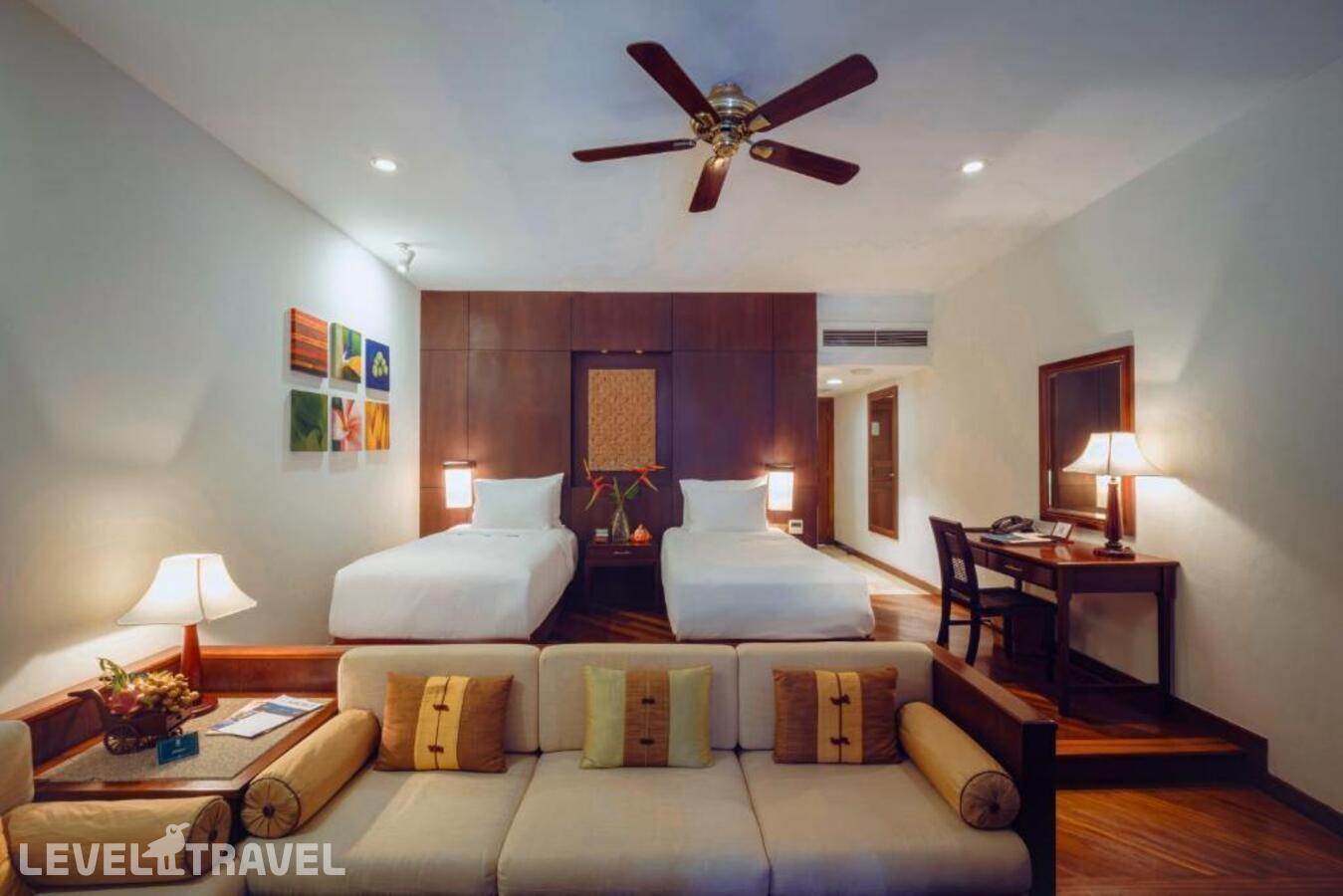 фотографии номера Студия Люкс (две односпальные кровати) отеля Furama Resort Danang в Вьетнам(Дананг) - фото №1