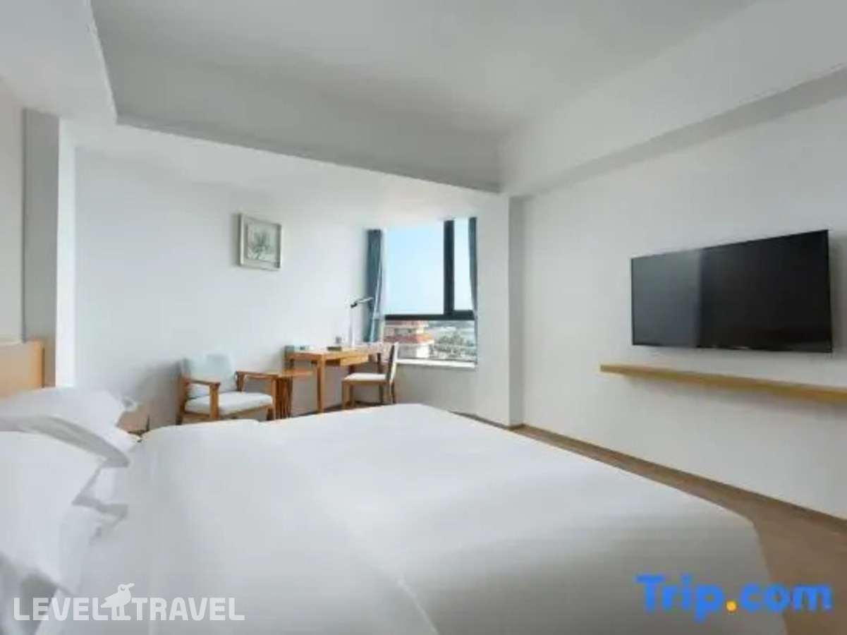 фотографии номера Стандартный с видом на озеро отеля South China Hotel в Китай(Дадунхай Бэй) - фото №4