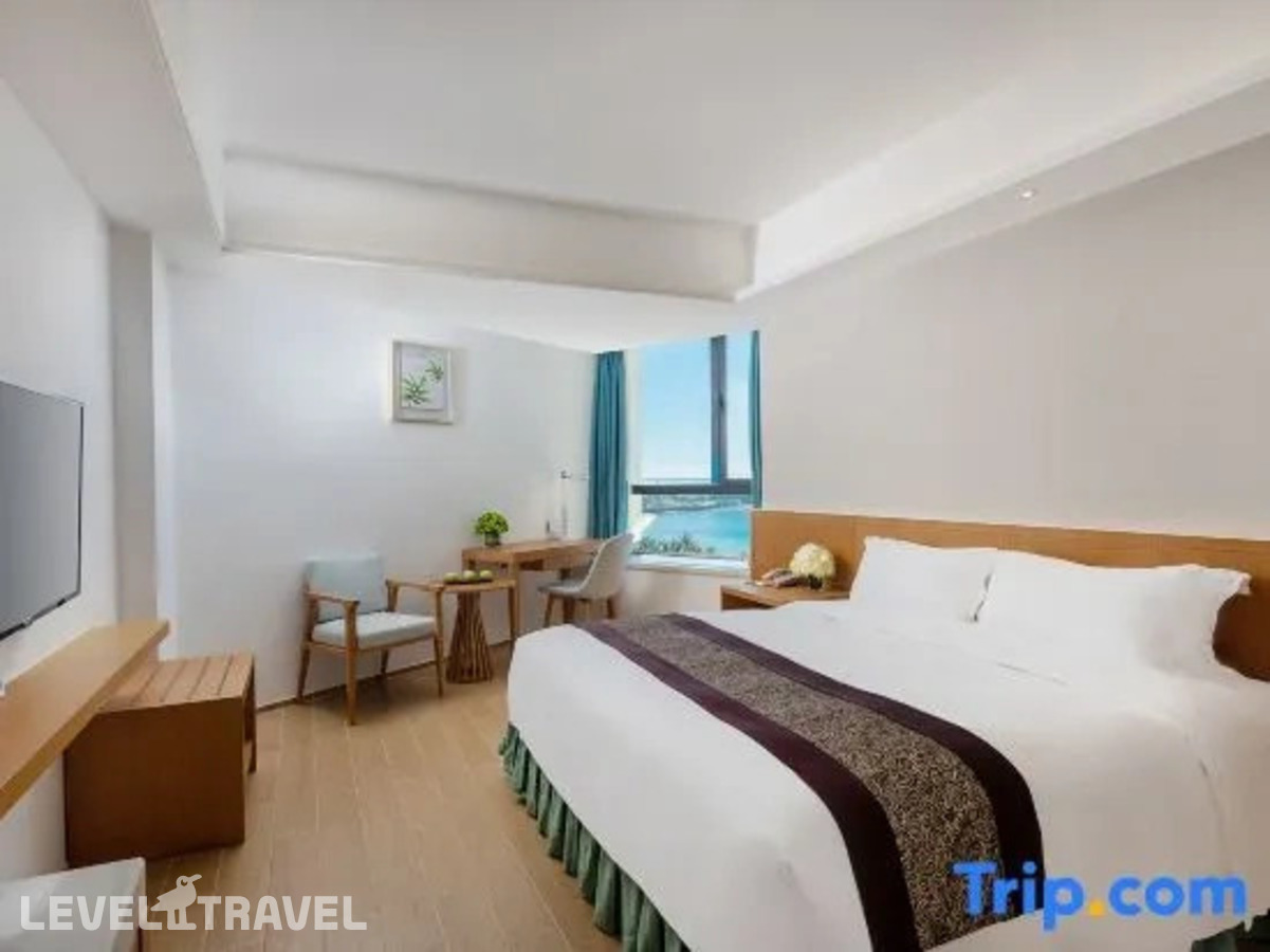 фотографии номера Стандартный с видом на озеро отеля South China Hotel в Китай(Дадунхай Бэй) - фото №1