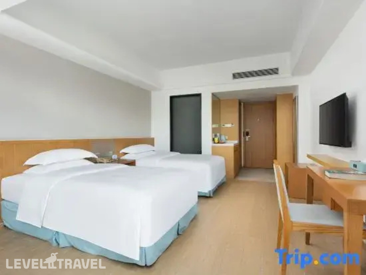 фотографии номера Стандартный с видом на сад (две односпальные кровати) отеля South China Hotel в Китай(Дадунхай Бэй) - фото №8