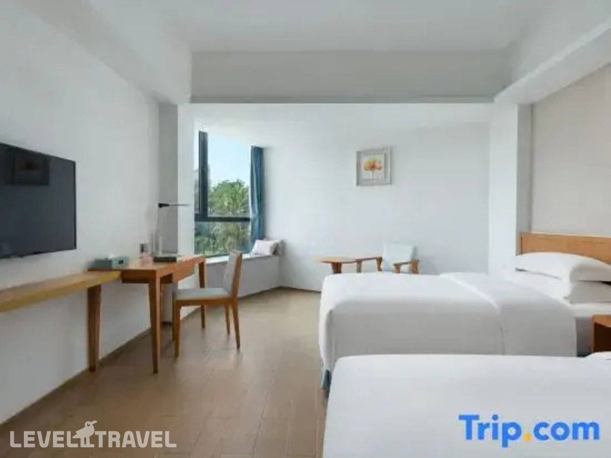 фотографии номера Стандартный с видом на сад (две односпальные кровати) отеля South China Hotel в Китай(Дадунхай Бэй) - фото №5