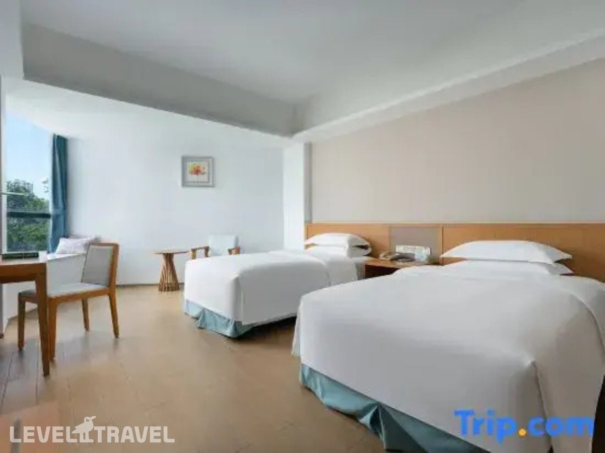 фотографии номера Стандартный с видом на сад (две односпальные кровати) отеля South China Hotel в Китай(Дадунхай Бэй) - фото №6