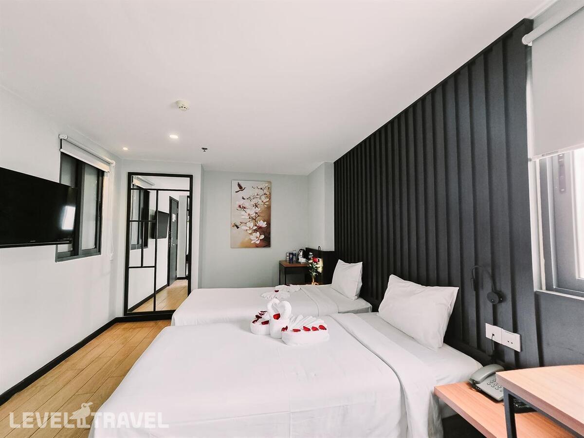 фотографии номера Улучшенный (две односпальные кровати) отеля Hermes Hotel Nha Trang в Вьетнам(Нячанг) - фото №1