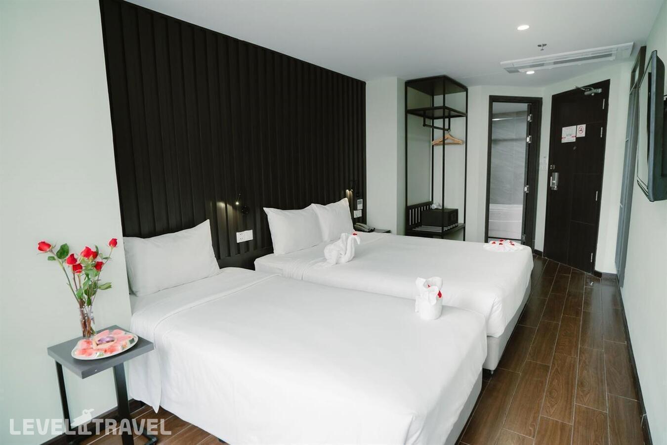 фотографии номера Трехместный делюкс отеля Hermes Hotel Nha Trang в Вьетнам(Нячанг) - фото №1