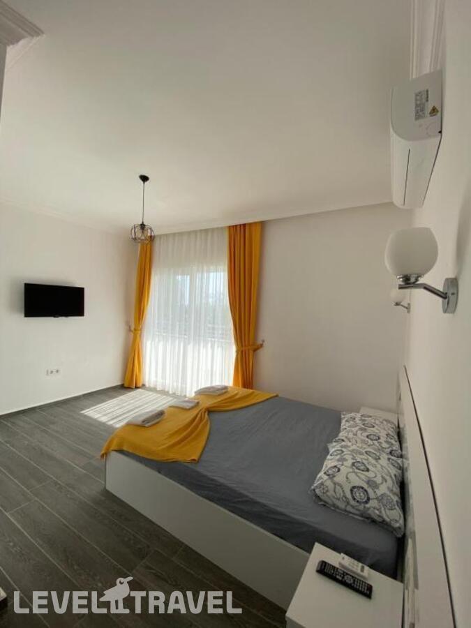 фотографии номера Семейный номер отеля Aroma Butik Hotel в Турция(Кызылот) - фото №2