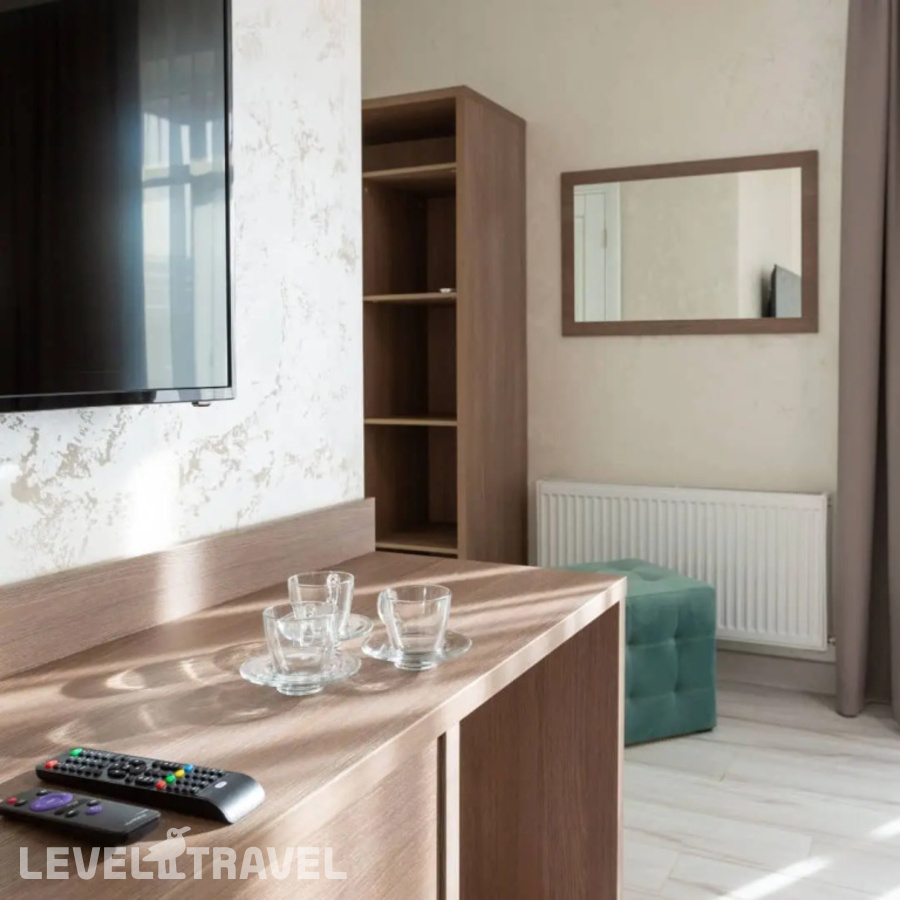 фотографии номера Трёхместный номер Comfort с балконом и с красивым видом из окна отеля Амра в Россия(Архыз) - фото №3