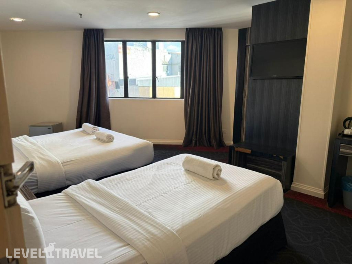 фотографии номера Трехместный номер отеля Sani Hotel Kuala Lumpur в Малайзия(Куала-Лумпур) - фото №1