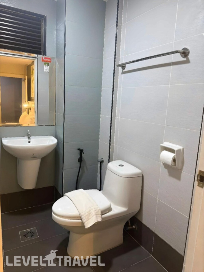 фотографии номера Четырехместный семейный отеля Sani Hotel Kuala Lumpur в Малайзия(Куала-Лумпур) - фото №9