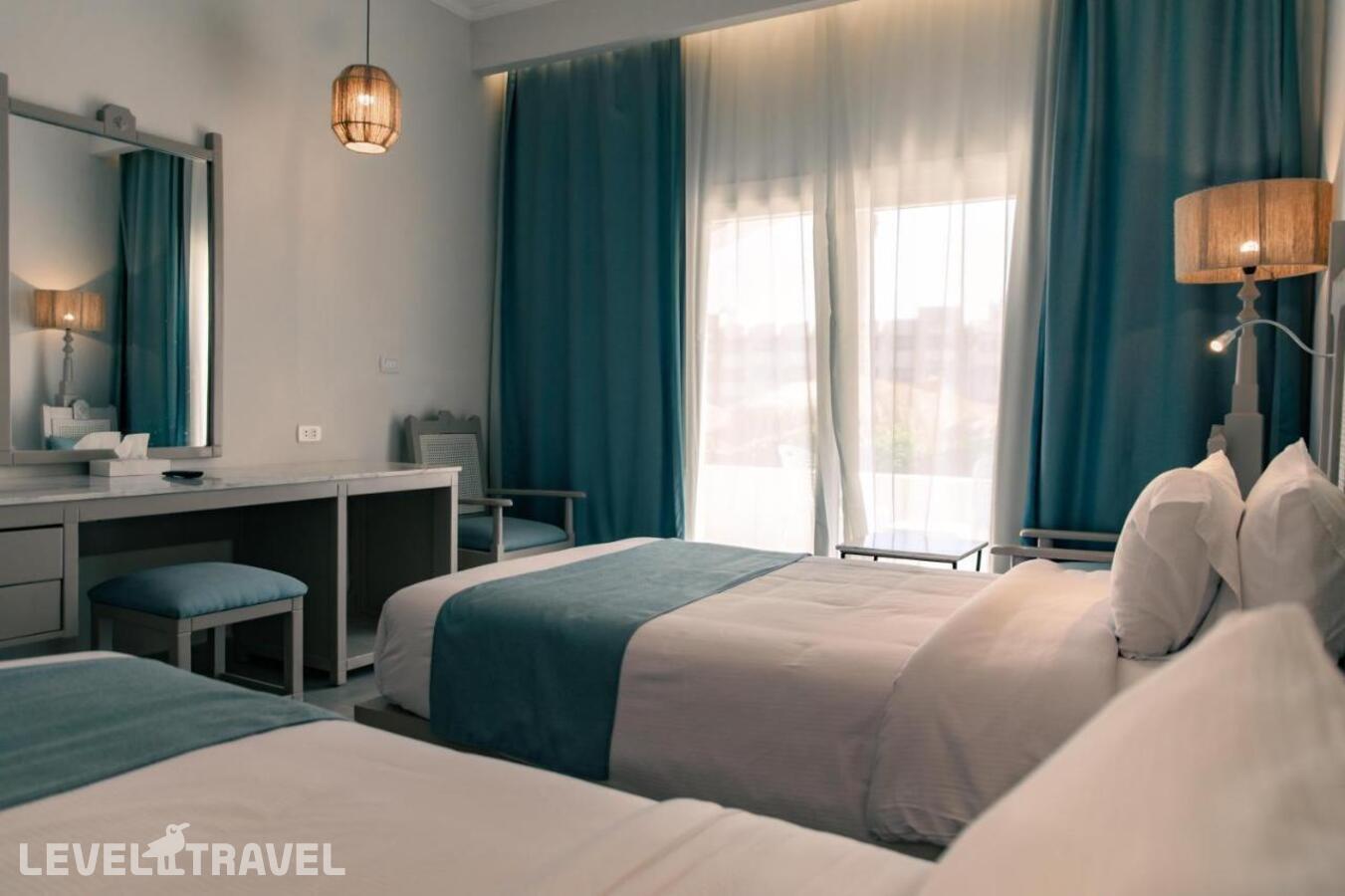 фотографии номера Делюкс с видом на бассейн отеля Sunny Days Resorts Spa & Aqua Park в Египет(Хургада (город)) - фото №1