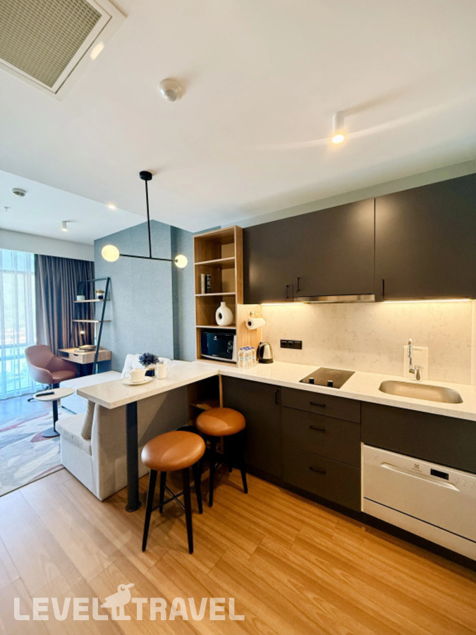 фотографии номера Люкс роскошный отеля Residence Inn By Marriott Istanbul Atasehir в Турция(Аташехир) - фото №2