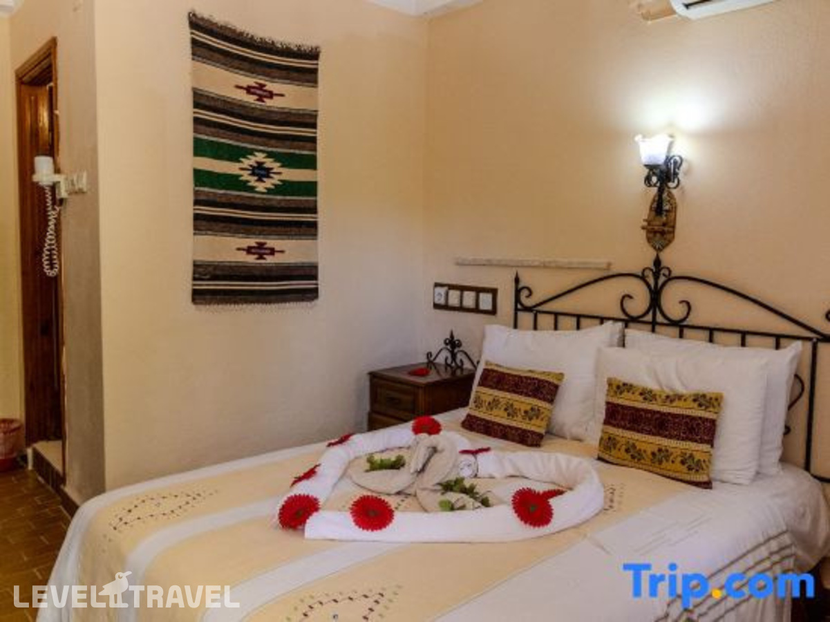 фотографии номера Экономичный с видом на сад отеля Yakamoz Hotel в Турция(Олюдениз) - фото №2