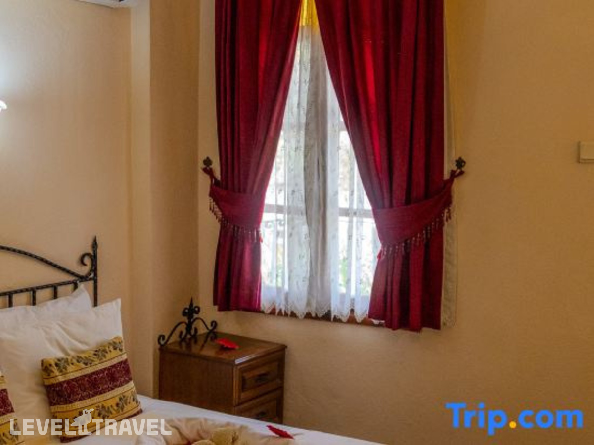 фотографии номера Экономичный с видом на сад отеля Yakamoz Hotel в Турция(Олюдениз) - фото №3