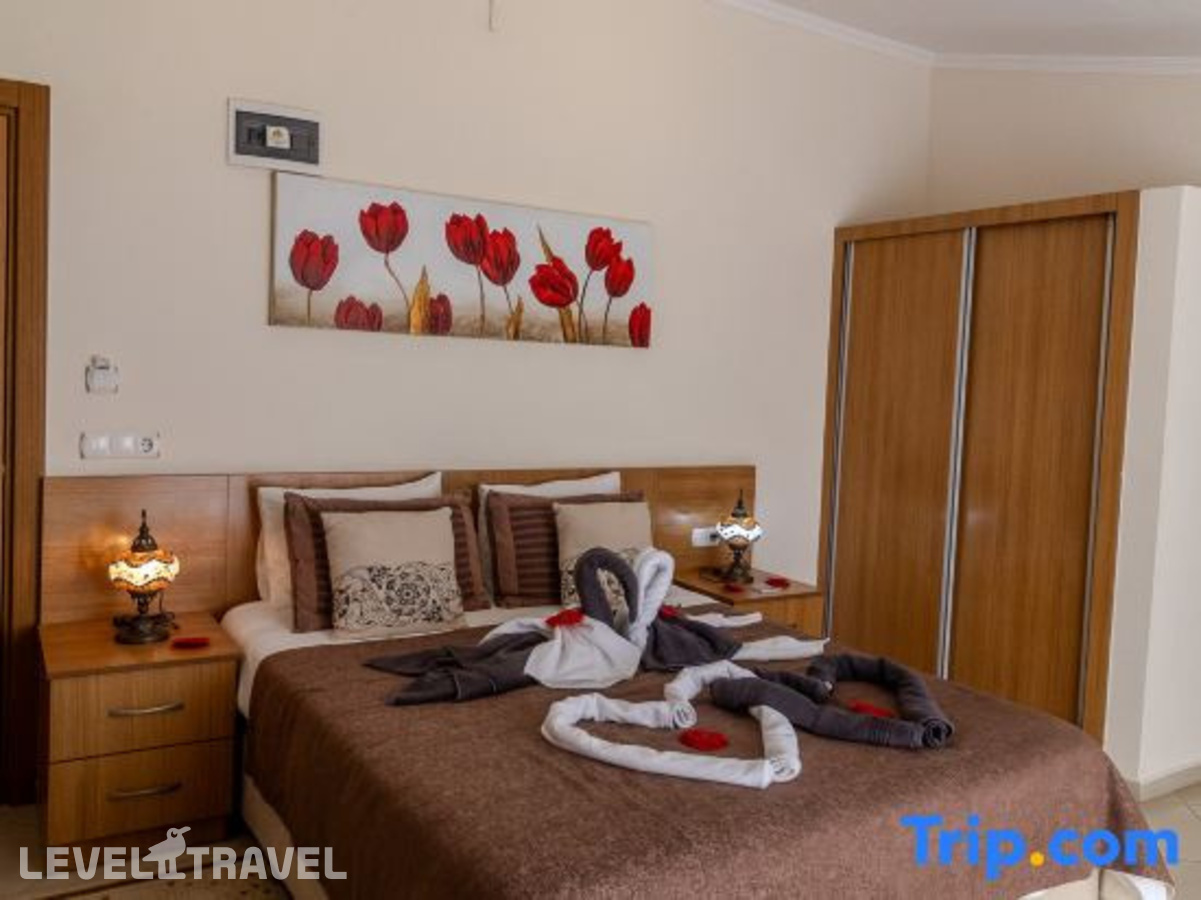 фотографии номера Делюкс с видом на горы отеля Yakamoz Hotel в Турция(Олюдениз) - фото №1