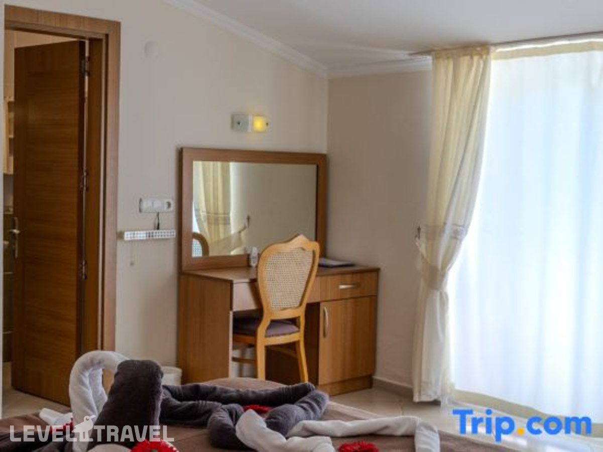 фотографии номера Делюкс с видом на горы отеля Yakamoz Hotel в Турция(Олюдениз) - фото №2