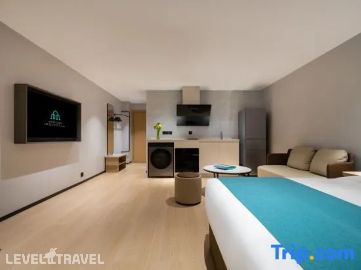 фотографии номера Апартаменты отеля Guang Dong Hotel в Китай(Гуанчжоу) - фото №1