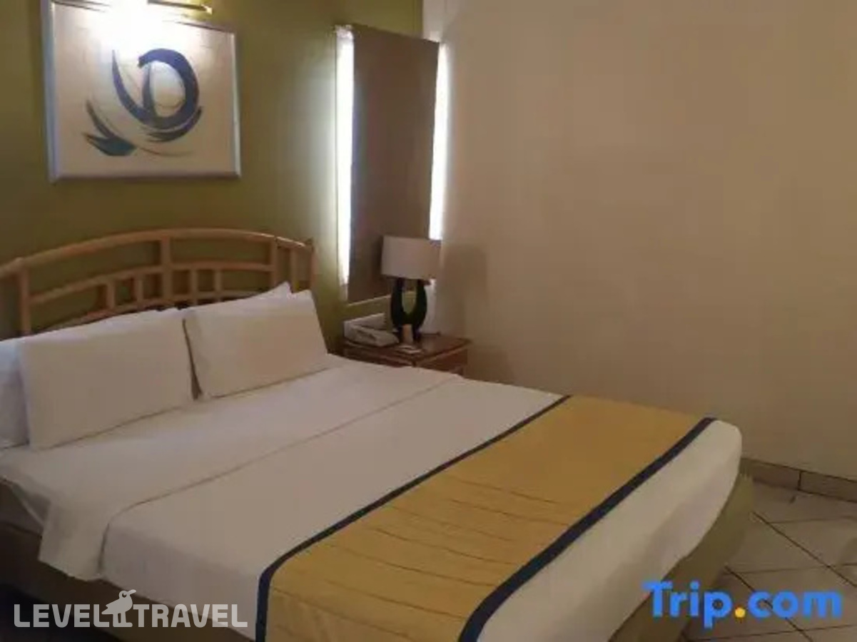 фотографии номера Улучшенный номер отеля Club Mahindra Emerald Palms Resort Goa в Индия(Варка) - фото №9