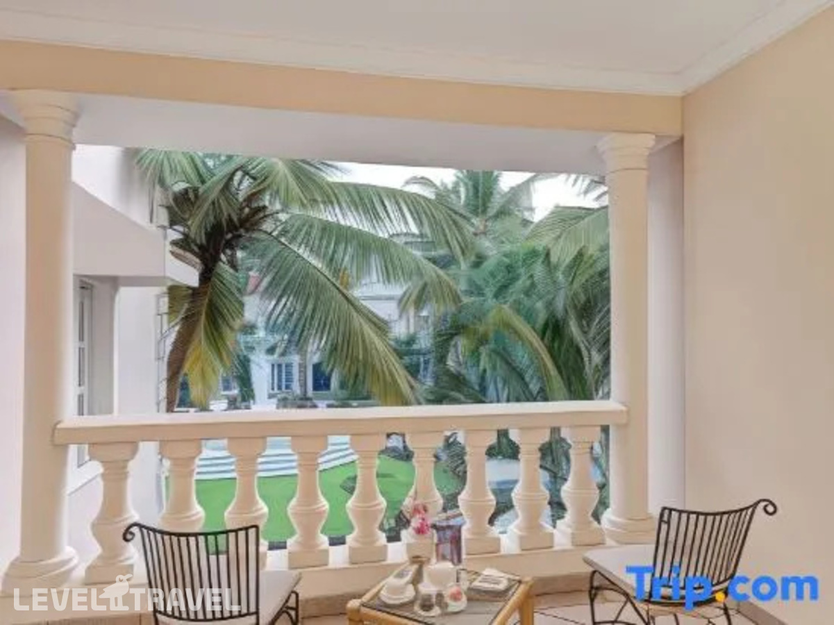 фотографии номера Улучшенный номер отеля Club Mahindra Emerald Palms Resort Goa в Индия(Варка) - фото №12