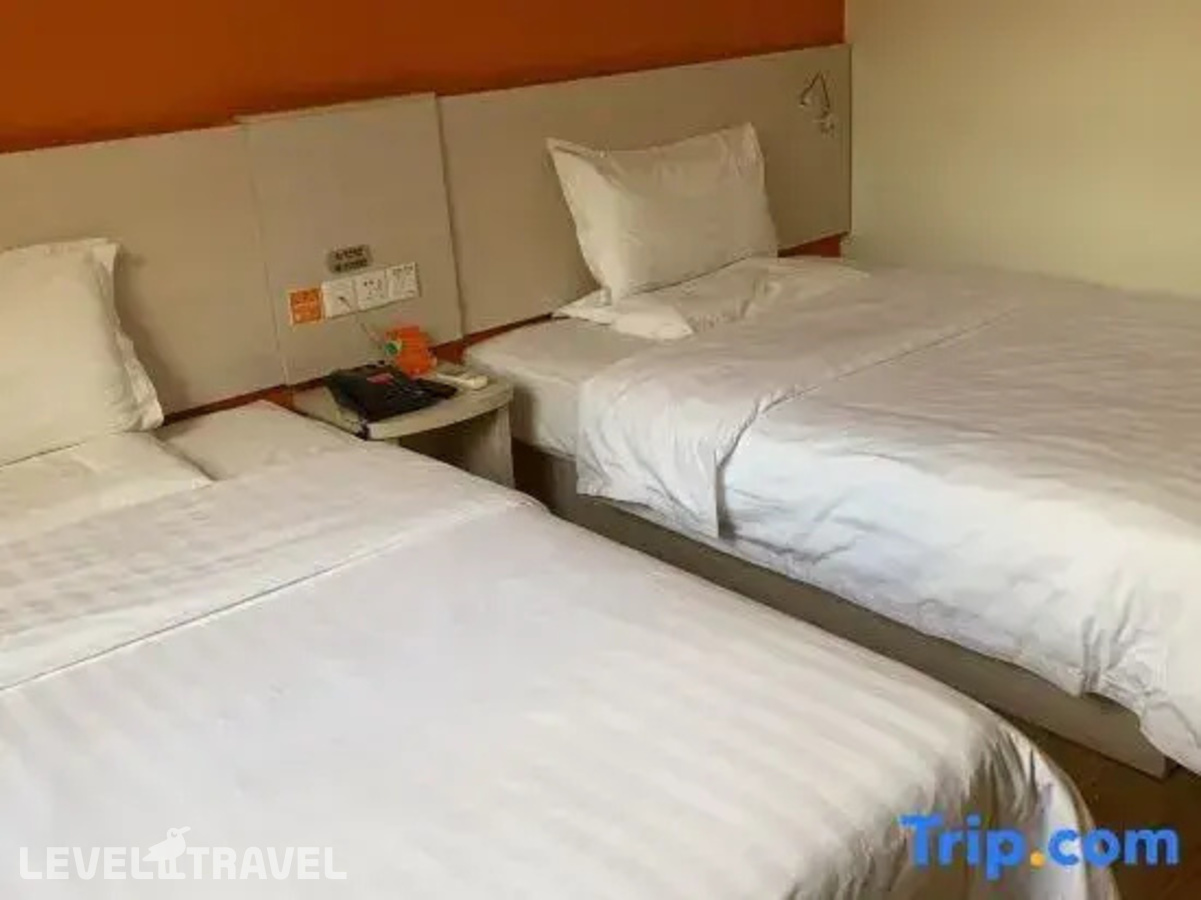 фотографии номера Улучшенный (две односпальные кровати) отеля 7 Days Inn Beijing Huairou в Китай(Пекин) - фото №2