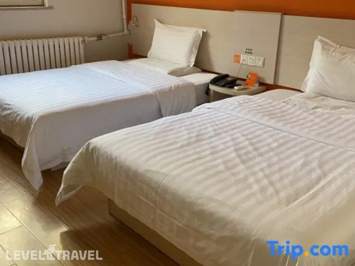 фотографии номера Улучшенный (две односпальные кровати) отеля 7 Days Inn Beijing Huairou в Китай(Пекин) - фото №3