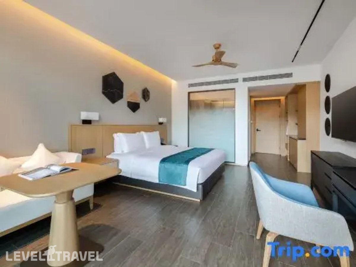 фотографии номера Улучшенный с видом на море отеля Sanya Junji Seaview Hotel в Китай(Санья) - фото №1