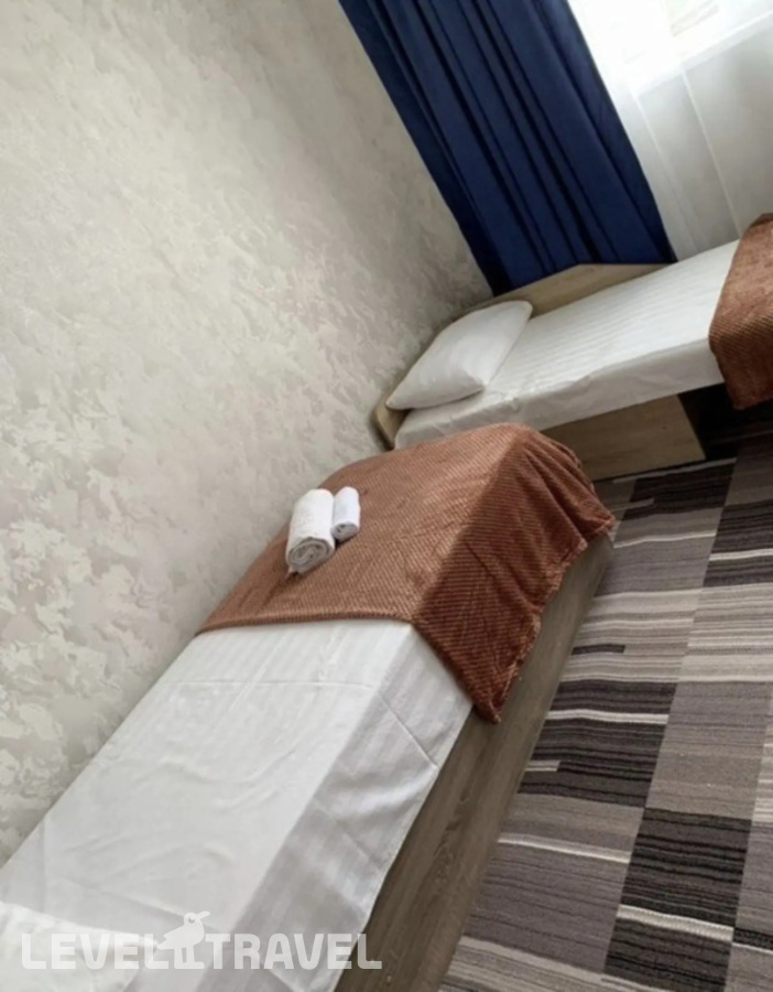 фотографии номера Четырёхместный семейный номер Comfort отеля Лантана в Абхазия(Цандрыпш) - фото №2