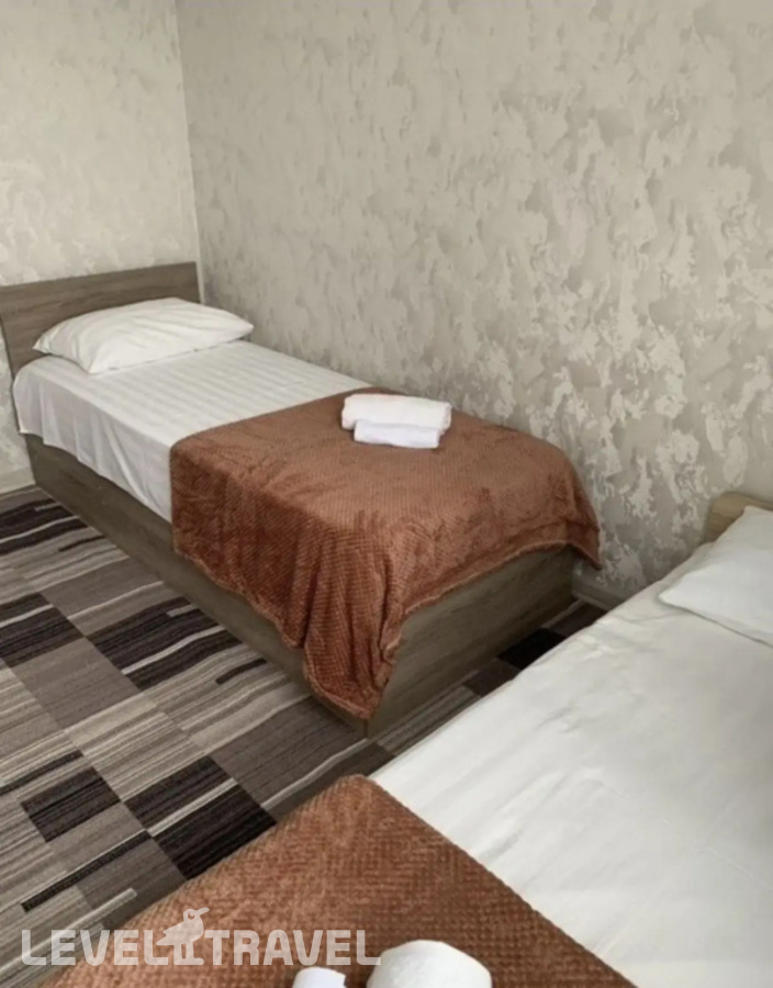 фотографии номера Четырёхместный семейный номер Comfort отеля Лантана в Абхазия(Цандрыпш) - фото №3