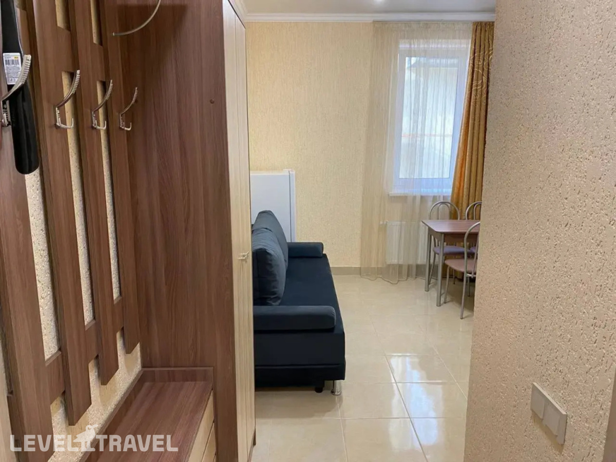 фотографии номера Трёхместный номер Comfort с видом на город отеля Михеев Велижанский Тракт в Россия(Тюмень) - фото №1