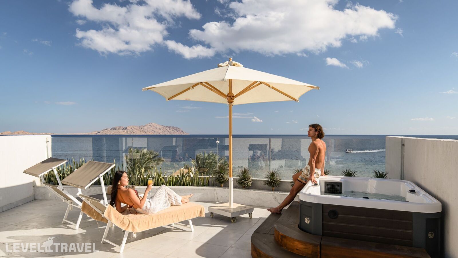 фотографии номера Двухуровневый люкс с джакузи отеля Sunrise Remal Resort в Египет(Рас-Насрани) - фото №3