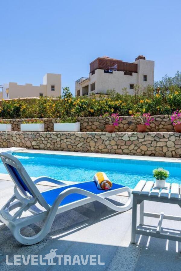 фотографии номера Номер Swim Up (две кровати) отеля Amwaj Oyoun Resort & Casino в Египет(Шарм-эль-Шейх) - фото №2