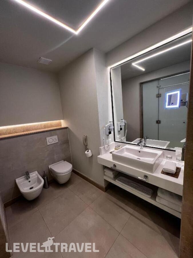 фотографии номера Полулюкс с видом на море отеля Reef Oasis Beach Resort в Египет(Рас-Ум-Эль-Сид) - фото №2