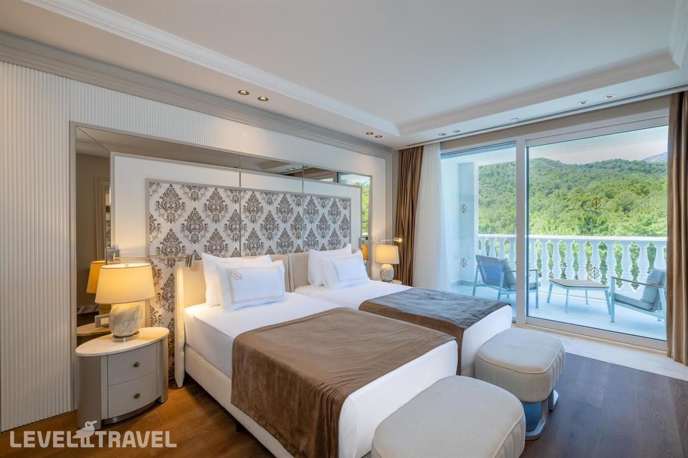 фотографии номера Фирменный семейный люкс Mare с видом на окрестности отеля Nirvana Dolce Vita (Ex. Amara Dolce Vita Luxury) в Турция(Текирова) - фото №3
