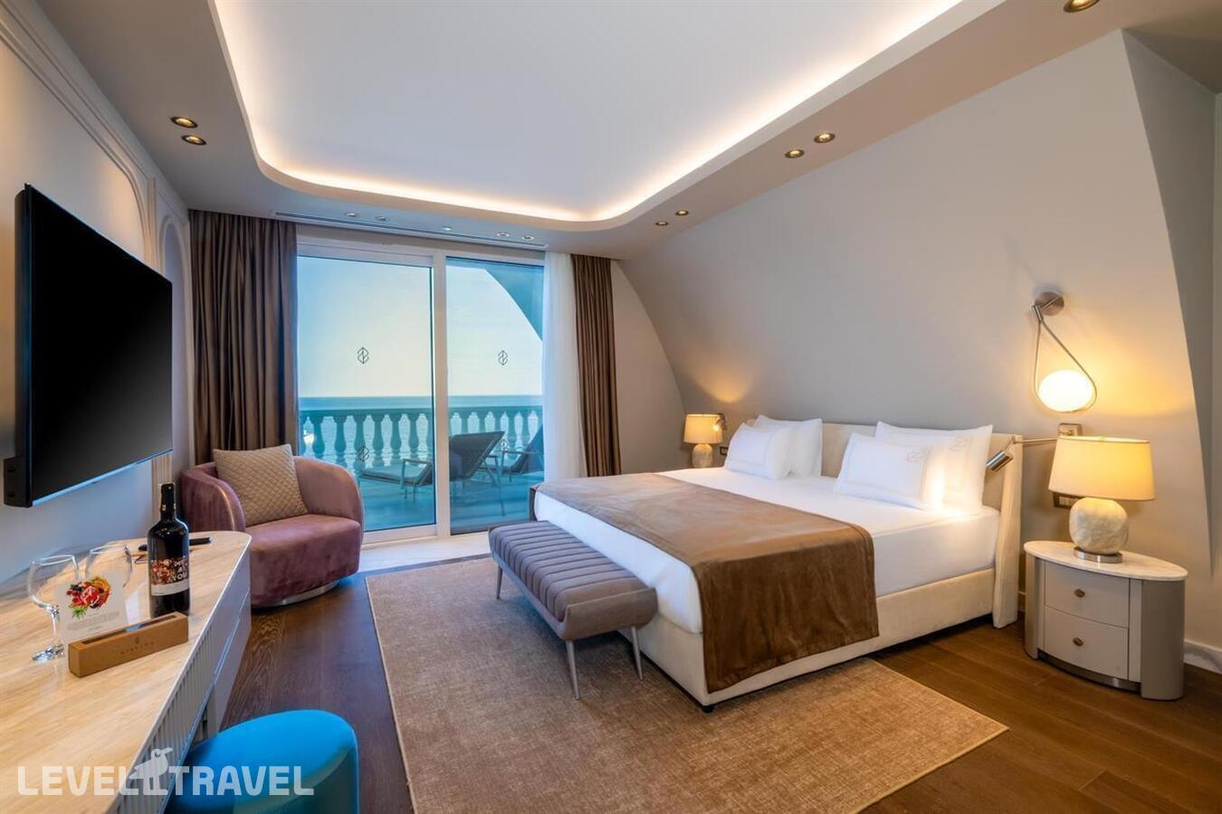 фотографии номера Семейный люкс Nido с видом на море отеля Nirvana Dolce Vita (Ex. Amara Dolce Vita Luxury) в Турция(Текирова) - фото №1