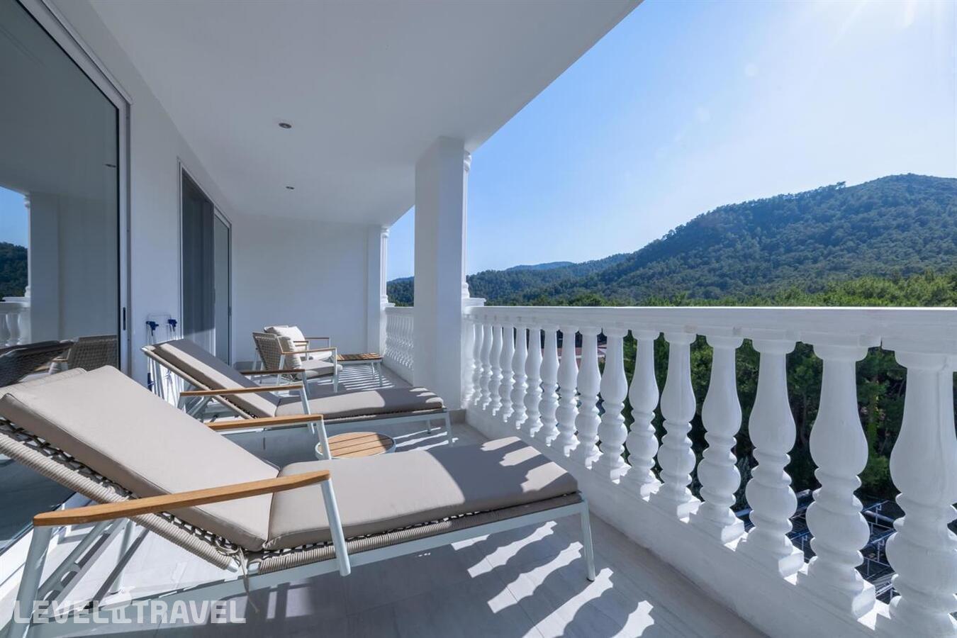 фотографии номера Семейный люкс Nido с видом на окрестности отеля Nirvana Dolce Vita (Ex. Amara Dolce Vita Luxury) в Турция(Текирова) - фото №6