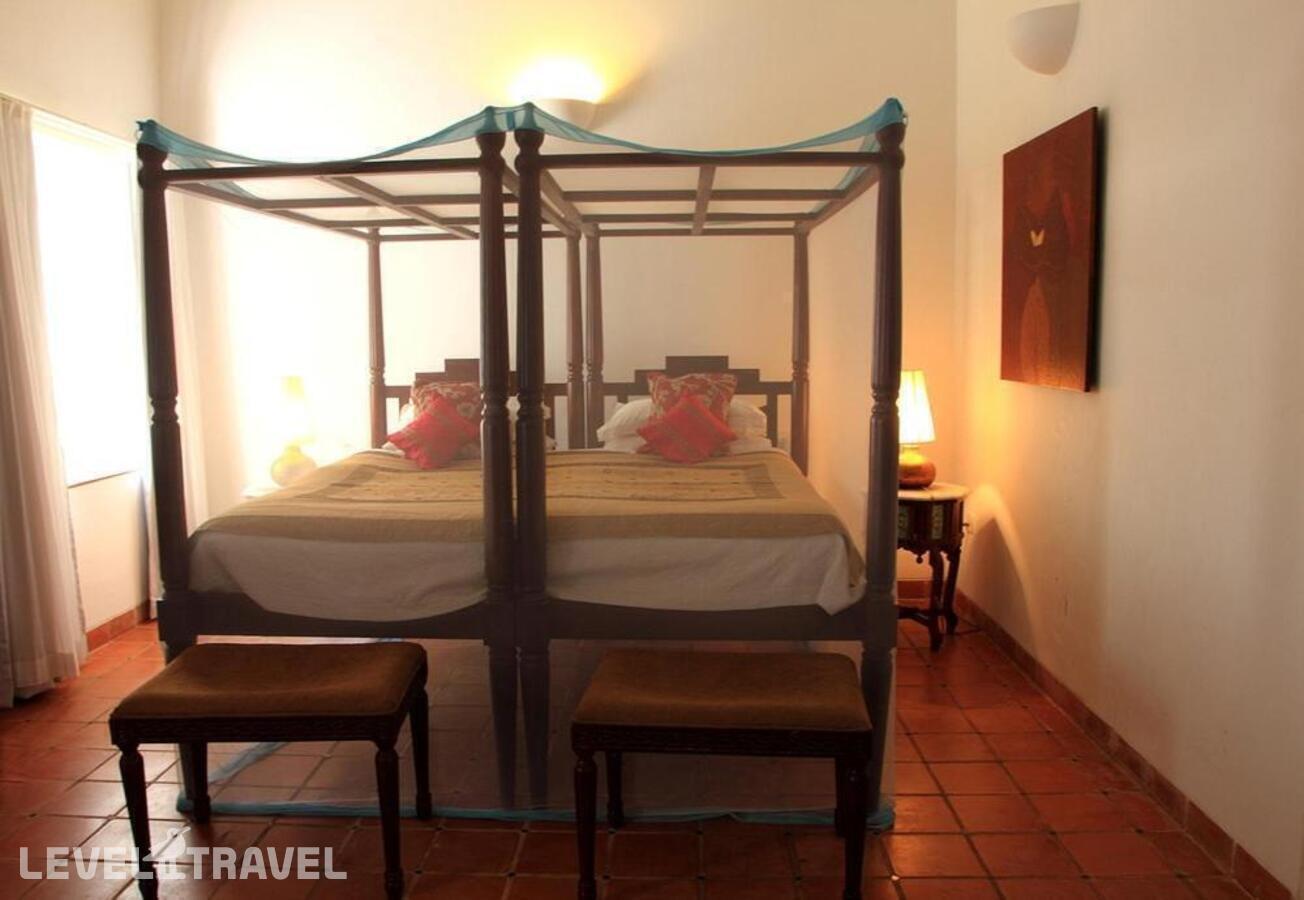фотографии номера Стандартный номер отеля La Casa Siolim Hotel в Индия(Сиолим) - фото №1