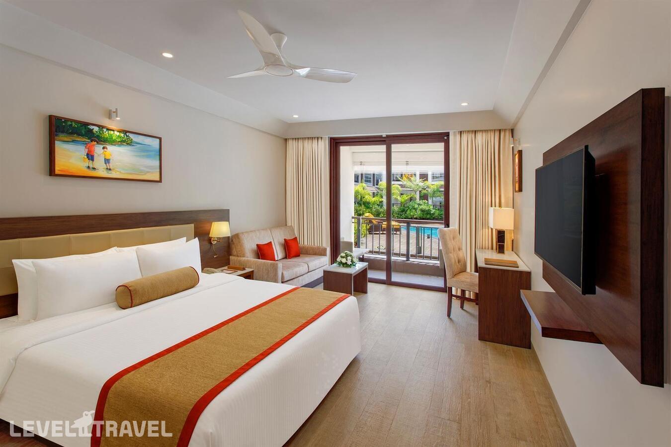 фотографии номера Делюкс с видом на бассейн отеля Sobit Sarovar Portico Goa Palolem в Индия(Палолем) - фото №1