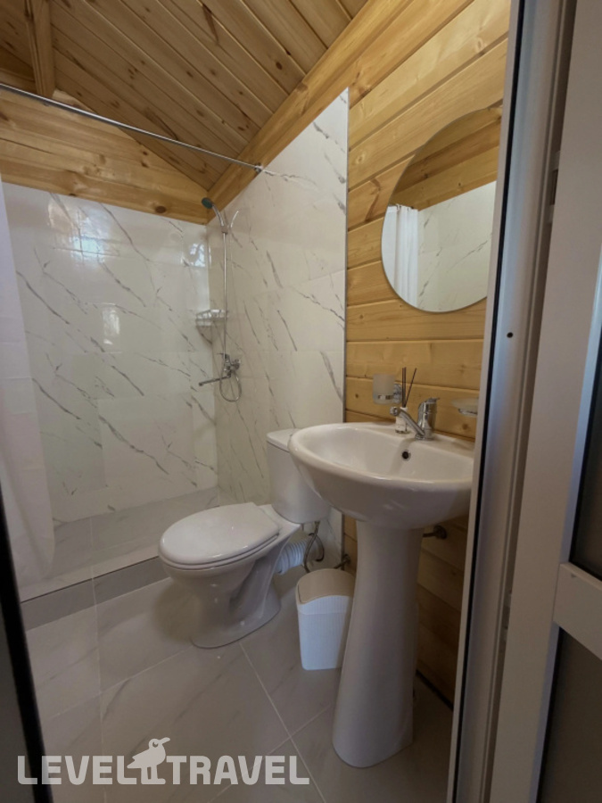 фотографии номера Трехместный с видом на сад отеля Гостевой Дом Guesthouse в Абхазия(Пицунда) - фото №3