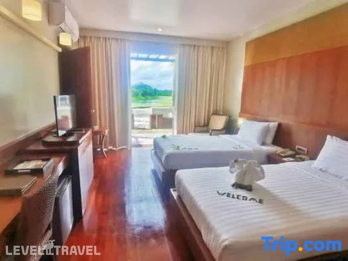 фотографии номера Делюкс с видом на сад отеля Mission Hills Golf Resort & Spa в Таиланд(Пор Бэй) - фото №14